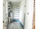 This storage area features lots of white shelving and a water heater at 1606 Mt Gallant Rd, Rock Hill, SC 29732