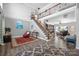 Grand foyer with high ceilings, staircase, hardwood floors, and ample natural light at 16115 Chiltern Ln, Huntersville, NC 28078