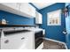 Well-lit laundry room featuring a Maytag washer and dryer, along with ample storage and counter space at 16115 Chiltern Ln, Huntersville, NC 28078