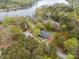Aerial view of a charming home nestled within a tranquil, wooded landscape at 1614 Fieldbrook Rd, Rock Hill, SC 29732
