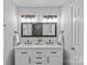 Beautiful bathroom with dual vanity, modern lighting, and elegant fixtures at 1614 Fieldbrook Rd, Rock Hill, SC 29732