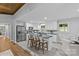 Bright kitchen with stainless steel appliances, white cabinets, gray counters and large center island at 1614 Fieldbrook Rd, Rock Hill, SC 29732