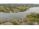 Aerial view of a calm lake surrounded by vibrant, green trees and houses at 1614 Fieldbrook Rd, Rock Hill, SC 29732