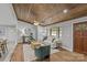 Cozy living room featuring stylish furnishings, hardwood floors, and a wood ceiling at 1614 Fieldbrook Rd, Rock Hill, SC 29732