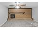 Cozy living room with brick fireplace and plush carpet at 1614 Fieldbrook Rd, Rock Hill, SC 29732