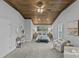 Bright main bedroom with wooden ceiling, soft carpet, and relaxing sitting area at 1614 Fieldbrook Rd, Rock Hill, SC 29732