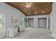 Large bedroom featuring a warm wooden ceiling, sitting area, and walk-in closets at 1614 Fieldbrook Rd, Rock Hill, SC 29732
