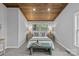 Inviting main bedroom with a wooden ceiling, plush carpet, and natural light from windows at 1614 Fieldbrook Rd, Rock Hill, SC 29732
