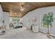 Spacious main bedroom with a stunning wooden ceiling, sitting area, and bright windows at 1614 Fieldbrook Rd, Rock Hill, SC 29732
