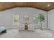 Comfortable sitting area with two chairs, center table, and natural light from two windows at 1614 Fieldbrook Rd, Rock Hill, SC 29732