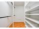 Organized walk-in closet with built-in shelves and hanging rods, offering ample storage space at 200 South Fork Dr, Shelby, NC 28152