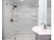 Bathroom with a shower and sink with blue walls at 2005 Douglas Rd, Lancaster, SC 28720