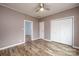 This bedroom features fresh paint, a ceiling fan, and a closet for amble storage at 2005 Douglas Rd, Lancaster, SC 28720