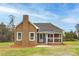 Cozy brick home with manicured lawn and covered porch at 2005 Douglas Rd, Lancaster, SC 28720
