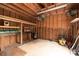 Spacious shed with a workbench, wooden walls, and ample storage space at 2005 Douglas Rd, Lancaster, SC 28720