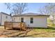Exterior view of a home featuring a deck, well-maintained siding, and windows that let in ample natural light at 248 Kerr Nw St, Concord, NC 28025