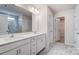 Bathroom with double vanity, marble floors and countertops, and views of shower and closet at 2639 Tillman St, Monroe, NC 28112