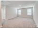 Bright bonus room with carpet and natural light at 2639 Tillman St, Monroe, NC 28112