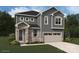 Charming two-story home with stone accents, gray siding, black door, and an attached two-car garage at 2639 Tillman St, Monroe, NC 28112