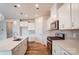 Well-equipped kitchen featuring an island, stainless steel appliances, and white cabinetry at 2639 Tillman St, Monroe, NC 28112