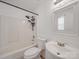 Bathroom features shower-tub combo, updated fixtures, and framed mirror at 314 Sugar Creek Xing, Fort Mill, SC 29715