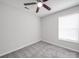 Bright bedroom features neutral walls, a ceiling fan, and plush carpeting at 314 Sugar Creek Xing, Fort Mill, SC 29715