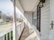 Inviting porch offering a cozy space to relax, enhanced by classic architectural details and a pleasant neighborhood view at 314 Sugar Creek Xing, Fort Mill, SC 29715