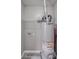 The image shows a hot water tank along with a utility shelf and water inlet at 314 Sugar Creek Xing, Fort Mill, SC 29715