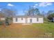 Exterior shot of a well-maintained home and spacious backyard at 327 Berry St, Rock Hill, SC 29732