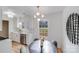 Bright dining area with a modern table, chairs, and updated kitchen at 327 Berry St, Rock Hill, SC 29732