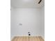 Unfurnished room with white walls, hardwood floors, and laundry hookups at 327 Berry St, Rock Hill, SC 29732