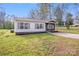 Well-maintained single-story home with manicured lawn and charming front porch at 327 Berry St, Rock Hill, SC 29732