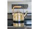 Close-up of a tea kettle sitting on top of a glass-top stove at 327 Berry St, Rock Hill, SC 29732