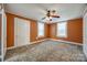 Inviting bedroom with a ceiling fan and dual windows, providing a bright and airy ambiance at 36 Brookline St, Great Falls, SC 29055