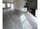 Bright open-concept living room with hardwood floors and an eat-in kitchen at 421 Rocky Brook Dr, Shelby, NC 28150