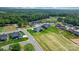 Community aerial view showcasing homes with manicured lawns and serene surroundings at 4227 Holly Ne Cir, Conover, NC 28613