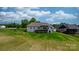 Expansive backyard featuring a well-maintained lawn and a charming white brick home at 4227 Holly Ne Cir, Conover, NC 28613
