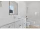 Bathroom featuring quartz countertops, a custom sink, and modern faucet hardware at 4227 Holly Ne Cir, Conover, NC 28613