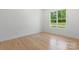 Bright bedroom with hardwood floors and a large window that offers natural light and view at 4227 Holly Ne Cir, Conover, NC 28613