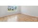 This bedroom offers plenty of natural light with hardwood flooring and neutral paint at 4227 Holly Ne Cir, Conover, NC 28613
