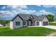 Charming one-story white brick home with a well manicured lawn and a three car garage at 4227 Holly Ne Cir, Conover, NC 28613