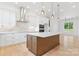 Modern open kitchen featuring custom cabinets, stone countertops and stainless appliances at 4227 Holly Ne Cir, Conover, NC 28613