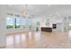 Bright and airy living room open to the kitchen with hardwood floors and many windows at 4227 Holly Ne Cir, Conover, NC 28613