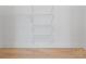 Walk-in closet featuring extensive shelving and storage options, optimizing space and organization at 4227 Holly Ne Cir, Conover, NC 28613