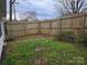 Fully fenced backyard providing privacy at 446 Windsor Ln, Statesville, NC 28677