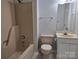 Cozy bathroom featuring tub-shower combo, toilet, and vanity with a light colored countertop at 446 Windsor Ln, Statesville, NC 28677