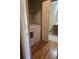 Convenient laundry room/closet near a bathroom with washer, dryer, and storage shelves at 446 Windsor Ln, Statesville, NC 28677