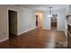Spacious living room with hardwood floors and views into kitchen at 446 Windsor Ln, Statesville, NC 28677