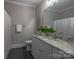 Bathroom with white vanity and granite counters at 447 Beacon Nw St, Concord, NC 28027