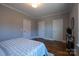 Spacious bedroom with hardwood floors, three closets, and lots of bright, natural light at 447 Beacon Nw St, Concord, NC 28027
